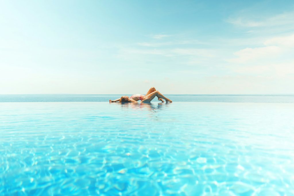 woman sun bathing on beach